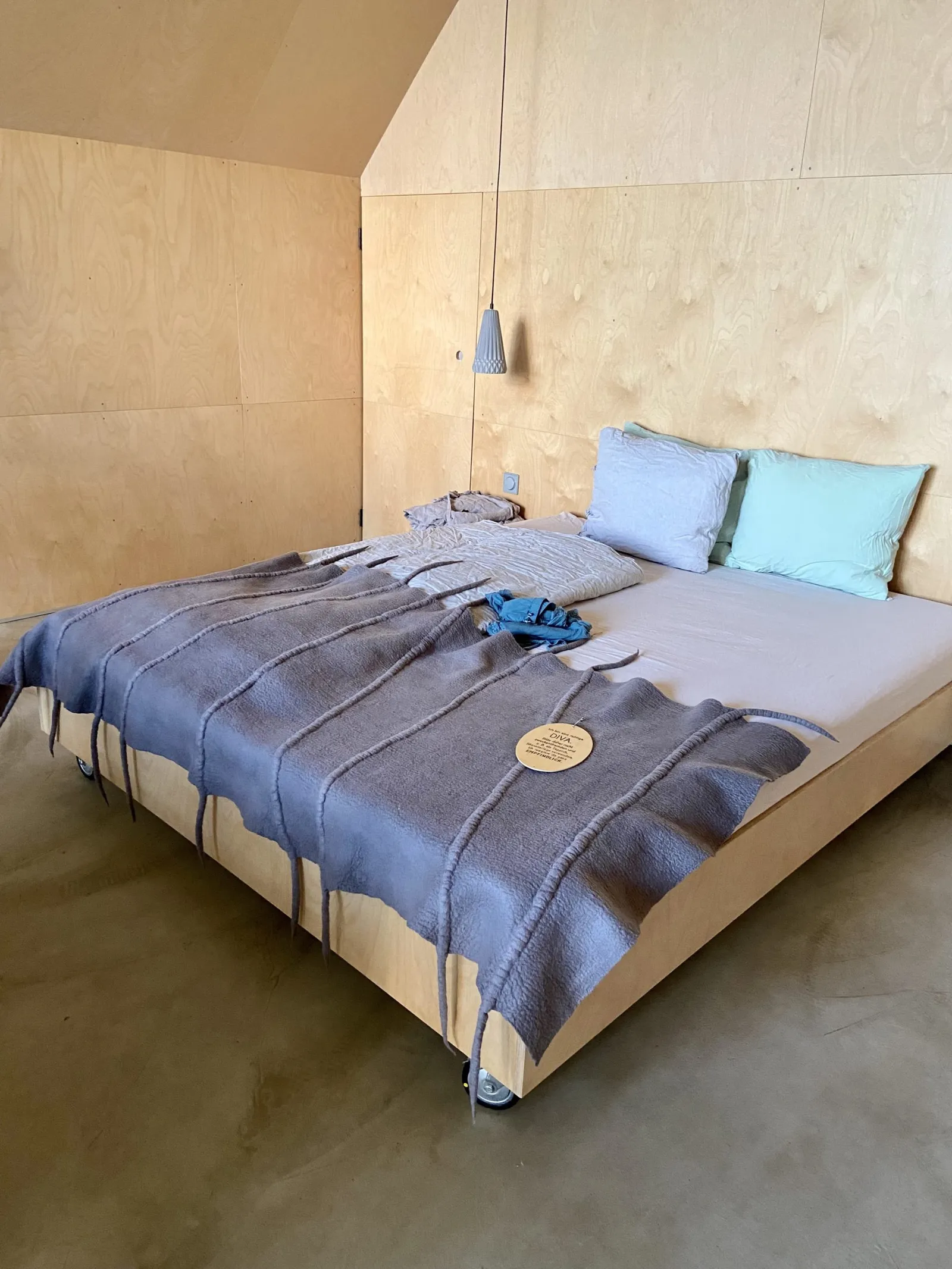 Bett im Weinloft